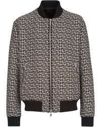 Balmain - Umkehrbare schwarze jacken mit rippendetails,wendbare bomberjacke mit monogrammmotiv - Lyst