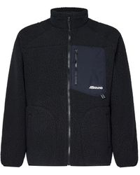 Mizuno - Jassen ,Zwart ,Polyester Zwarte Omkeerbare Winddichte Jas - Lyst
