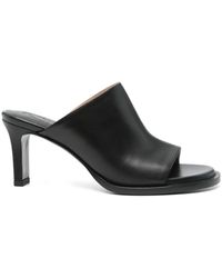 Tod's - Schwarze sandalen mit mittelhohem absatz - Lyst