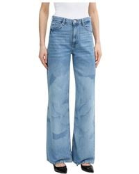 Guess - Gedrukte Jeans Met Wijde Pijpen - Lyst