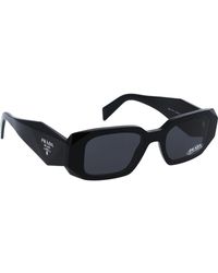 Prada - Ikonoische sonnenbrille mit einheitlichen gläsern - Lyst