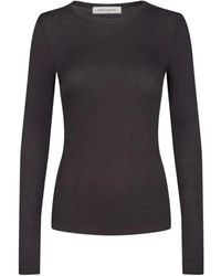 Sofie Schnoor - Zwarte Blouse Met Lange Mouwen En Strakke Pasvorm - Lyst