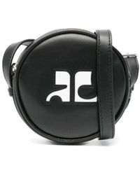 Courreges - Schwarze leder schultertasche mit kreismotiv - Lyst