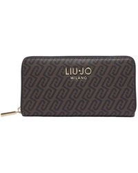 Liu Jo - Accessoires ,Bruin ,Grote Portemonnee Met Monogramreliëf - Lyst