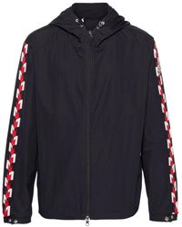 Moncler - Cappotto blu con patch logo - Lyst