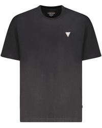Guess - Zwarte Katoenen T-Shirt Trendsetter - Lyst