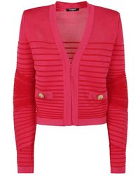 Balmain - Truien & Vesten ,Roze ,Gebreid Vest Met Zijdelingse Flechage Ontwerp - Lyst