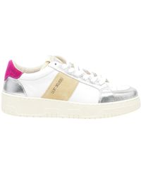 SAINT SNEAKERS - Sneakers in pelle bianca con dettagli argento e fucsia - Lyst