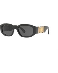 Versace - Occhiali da sole neri con design elegante - Lyst