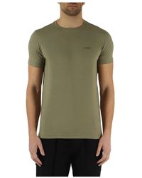 Calvin Klein - T-shirt slim fit in cotone elasticizzato con patch logo frontale - Lyst