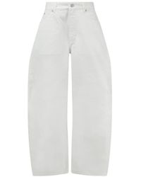 Alaïa - Round Wide-Leg Jeans - Lyst