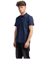 Guess - Paul pique tape polo blu scuro - Lyst