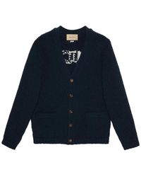 Gucci - Cardigan in lana intarsiata con logo - Lyst