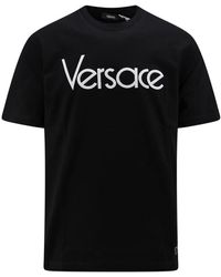 Versace - T-shirt e polo nere con ricamo del logo - Lyst