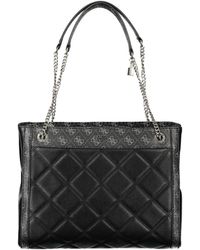 Guess - Schwarze polyurethan-handtasche mit schultergriffen und mehreren fächern - Lyst