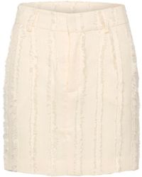 Gestuz - Falda de cintura alta con detalles deshilachados afterglow - Lyst