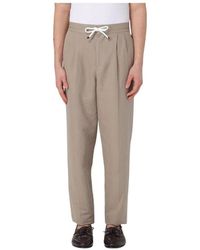 Brunello Cucinelli - Blaue Leinenhose Mit Kordelzug Und Lockerer Passform - Lyst