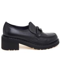 Calpierre - Pumps - Lyst