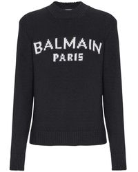 Balmain - Truien & Vesten ,Zwart ,Wol Klassiek Sweatshirt Met Parijs-Print - Lyst