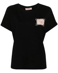 Twin Set - Schwarzes t-shirt mit logo-patch und strassverzierung - Lyst