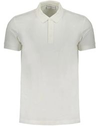 Calvin Klein - Tops > polo shirts - Lyst