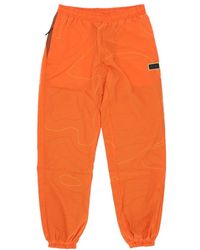 DOLLY NOIRE - Broeken ,Oranje ,Polyester Oranje Baggy Trainingsbroek Met Mesh - Lyst