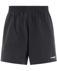 Jil Sander - Schwarze logo-print-shorts mit elastischem bund - Lyst