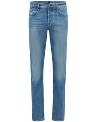 BOSS - Tapered fit jeans - Lyst