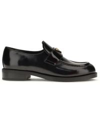Prada - Bos Taurus Slip-On Loafers - Lyst