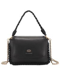 La Carrie - Schwarze leder-schultertasche mit quasten - Lyst