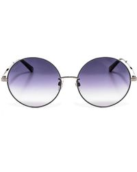 Swarovski - Accessoires ,Grijs ,Ronde Metalen Zonnebril Sk 0301-K Voor Vrouwen - Lyst