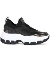 Guess - Sneakers mit logo-print aus stoff und kunstleder - Lyst