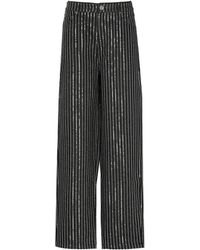 ROTATE BIRGER CHRISTENSEN - Pantalones negros de sarga de algodón con estampado de rayas - Lyst