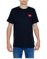 New Balance - T-shirt frühling/sommer kollektion - Lyst