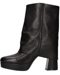 Emanuélle Vee - Schoenen ,Zwart ,Leer Enkellaarsjes Met Hak - Lyst