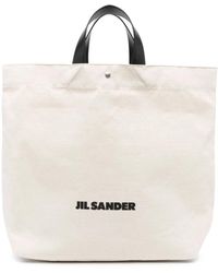 Jil Sander - Weiße taschen mit lederbesatz und logo-druck - Lyst
