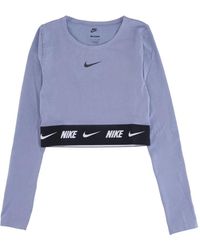 Nike - Fitness ,Paars ,Polyester Sportswear Crop Tape Lange Mouw Top - Lyst
