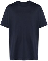 Givenchy - Blaues jersey-t-shirt mit geprägtem logo und rundhalsausschnitt - Lyst
