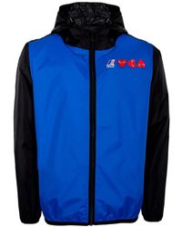 COMME DES GARÇONS PLAY - Jassen ,Blauw ,Functionele Regenjas - Lyst