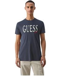 Guess - Baumwoll-logo t-shirt - blaue gerade passform - Lyst