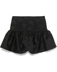ROTATE BIRGER CHRISTENSEN - Schwarzer rock mit floralem jacquardmuster und puffball-saum - Lyst
