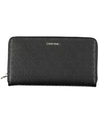 Calvin Klein - Sleek Designer Three-Compartment Wallet - Lyst