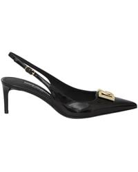 Dolce & Gabbana - Zapatos de tacón slingback negros con logo dg dorado - Lyst