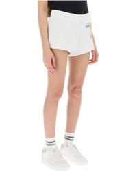 Moschino - Shorts mit logo-print aus bio-baumwolle,logo bedruckte shorts aus bio-baumwolle - Lyst