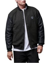 DOLLY NOIRE - Bomber Jackets - Lyst