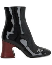 Chloé - Schoenen ,Zwart ,Leer Zwarte Leren Laarzen Met Koeienhuid Hak - Lyst