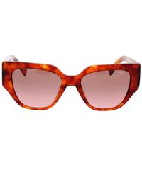 Vogue - Sonnenbrille mit unregelmäßiger form und mutigem und dynamischem stil - Lyst