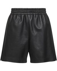 Gucci - Korte Broeken ,Zwart ,Leer Zwarte Leren Jersey Shorts Met Zakken - Lyst