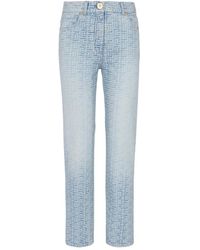 Balmain - Jeans in denim straight-cut con monogramma - Lyst