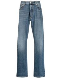 Alexander McQueen - Stonewashed denim jeans mit umgeschlagenem saum - Lyst